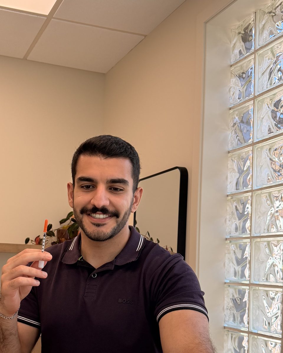 Dr. Parsa Rajabi in a treatment room at FaceCrime Skin Labs, Vancouver